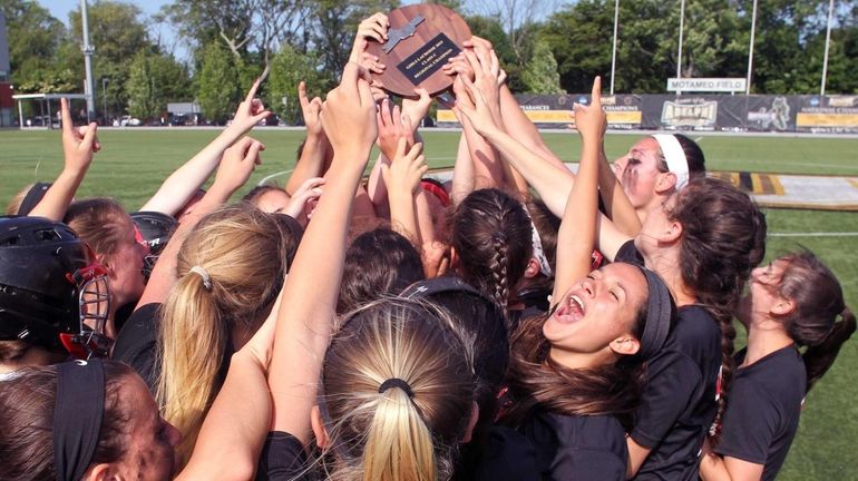 Mt. Sinai celebrates its win in the Long Island Class...