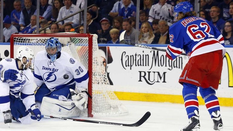 Ben Bishop #30 of the Tampa Bay Lightning makes a...