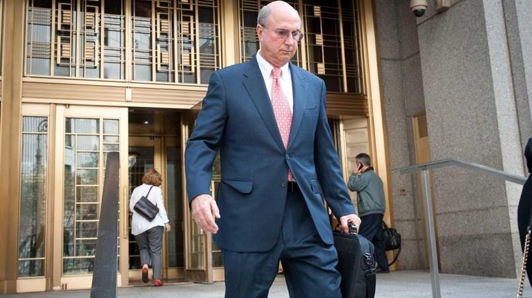 Former New York Islanders executive Stephen Walsh leaves federal court...