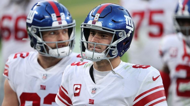 Quarterback Daniel Jones #8 of the Giants reacts to a 27-13...