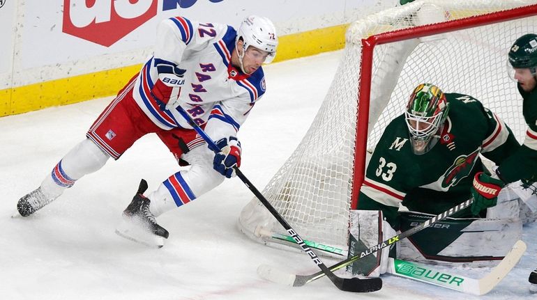 Rangers center Filip Chytil is stopped by Wild goaltender Cam...