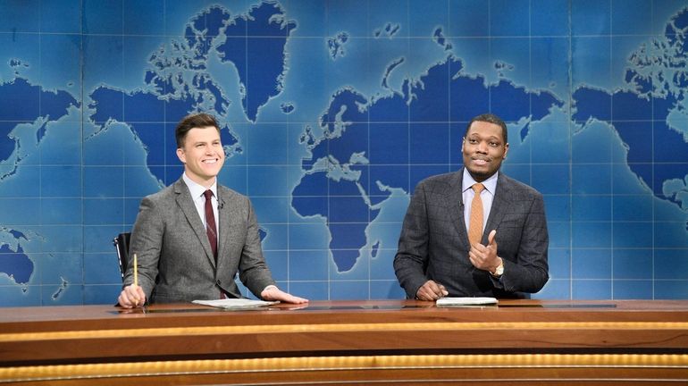 "Weekend Update" anchors Colin Jost, left, and Michael Che appear...