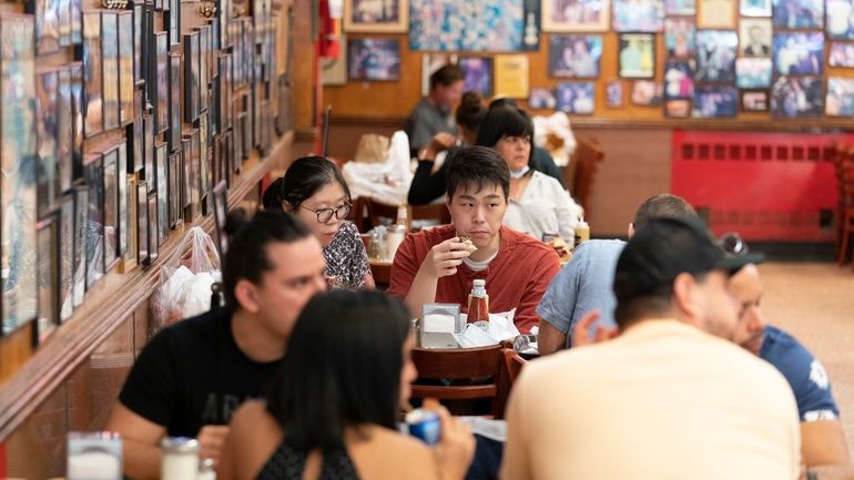 Customers have lunch at Katz's Delicatessen on Sept. 30, 2020...