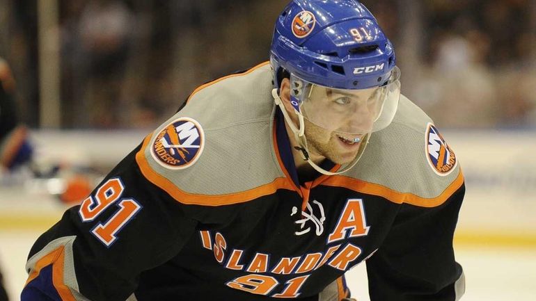 John Travares of the Islanders prepares for a face-off against...