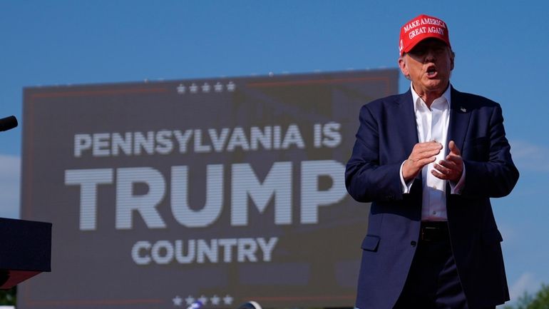 Republican presidential candidate former President Donald Trump arrives for a...