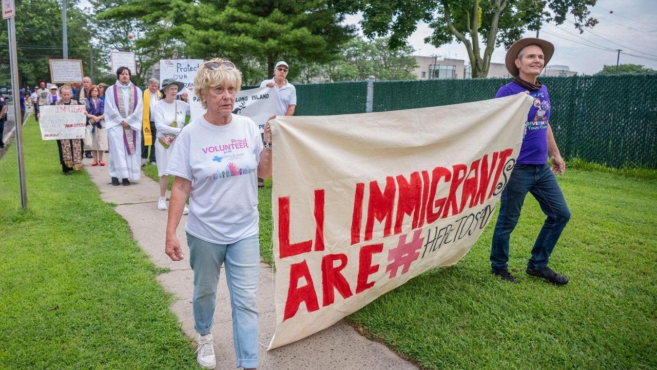 Interfaith faith leaders walk and pray for immigrant justice - Newsday