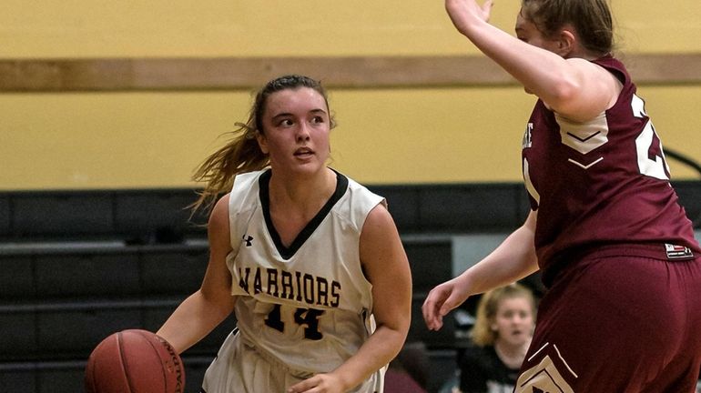 Wantagh's Irene Huguet drives against North Shore 's Eleanor Casale during a Nassau County playoff...