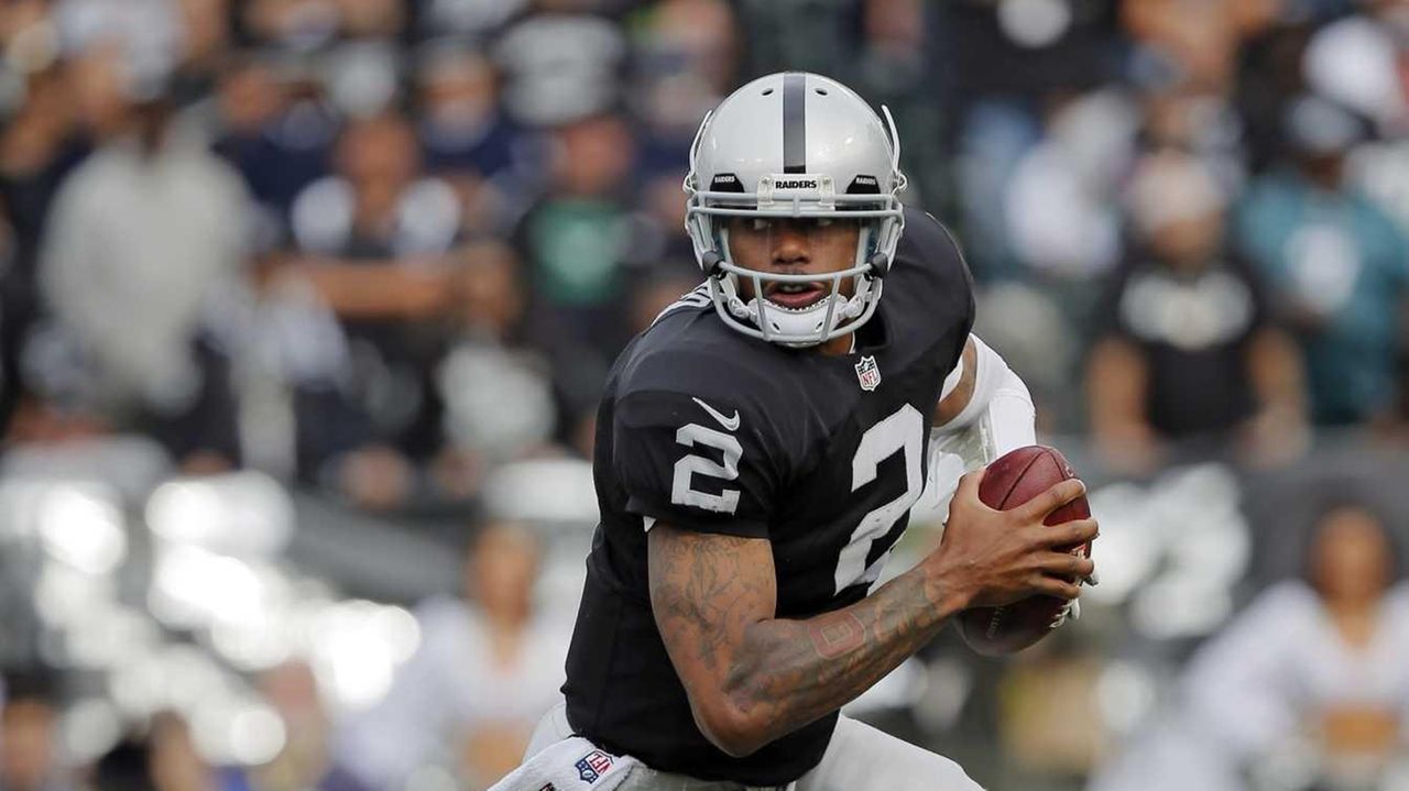 Oakland Raiders keep slim postseason hopes alive after defeating