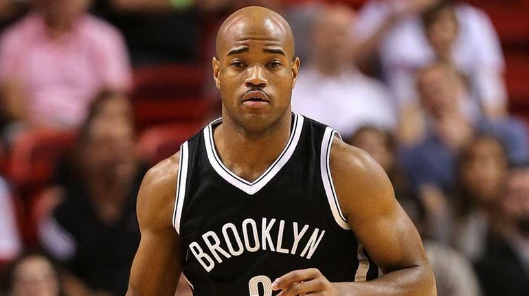 Jarrett Jack #2 of the Brooklyn Nets dribbles during a...