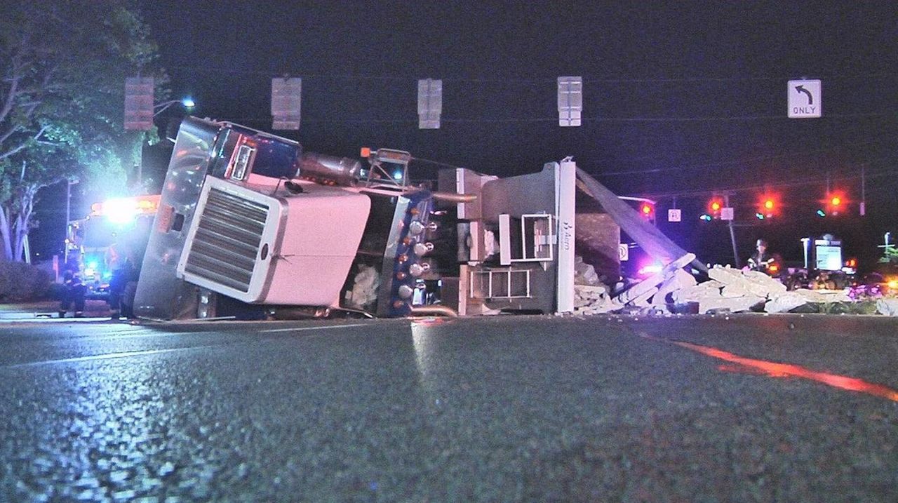 Jericho Tpke. in Commack reopens after truck overturns, police say