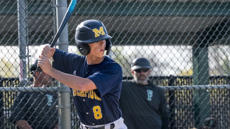 Matthew Homan of Massapequa stands ready at the plate during...