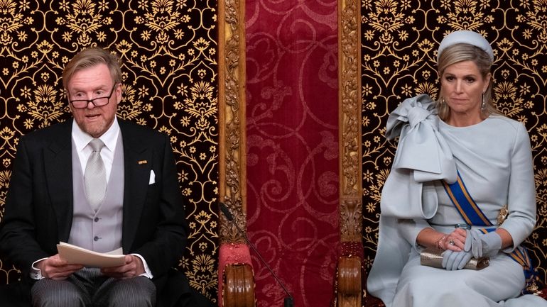 Dutch King Willem-Alexander, seated next to Queen Maxima, outlines the...