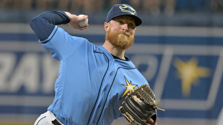 Tampa Bay Rays starter Drew Rasmussen pitches against the Baltimore...