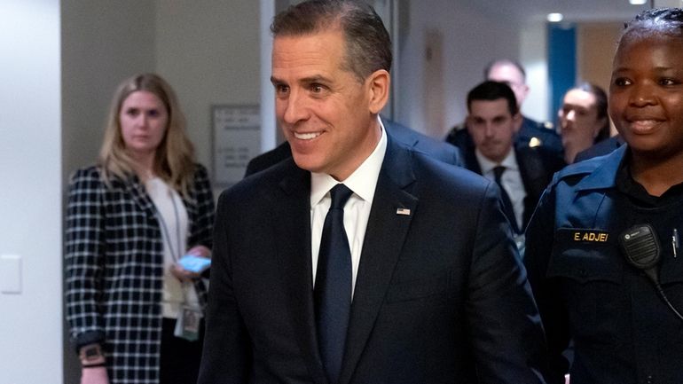 Hunter Biden departs after a closed door private deposition with...