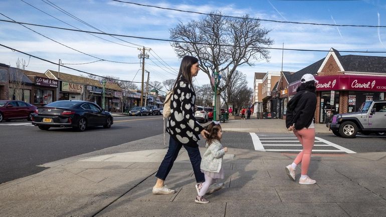 Massapequa Park, one of the villages that has lost population,...