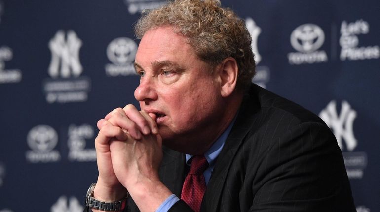 New York Yankees president Randy Levine looks on during a...