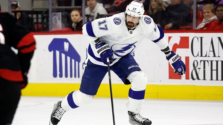 Tampa Bay Lightning's Alex Killorn (17) skates with the puck...