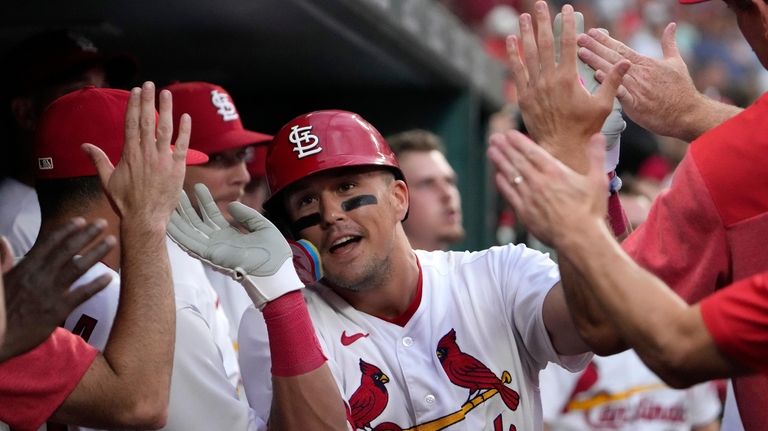 Cardinals to play a doubleheader Saturday after rain suspends Friday's  series opener