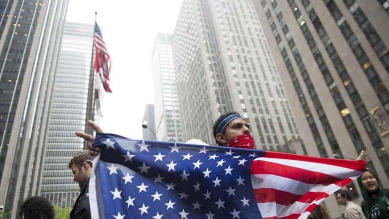 Occupy Wall Street protesters marched through the streets of Manhattan....