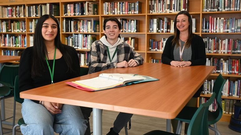 Valley Stream North school counselor Janna Brodman, right, with seniors...