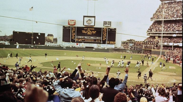 The celebration at Shea Stadium after the Mets defeated the...
