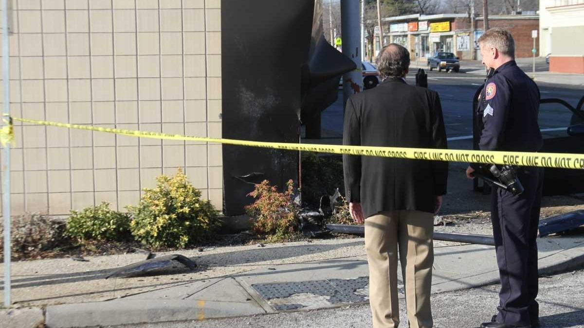 Man dies after car crashes into building - Newsday