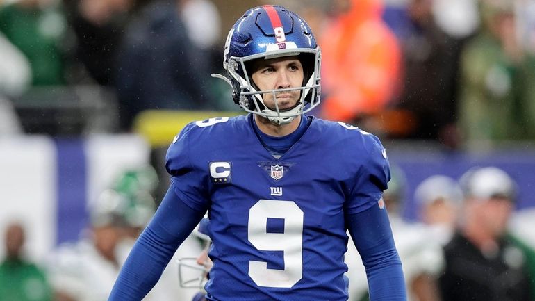 Graham Gano of the Giants reacts after missing a field goal...