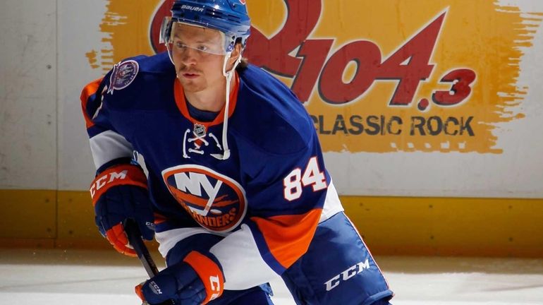 Mikhail Grabovski of the Islanders skates in warmups before a...