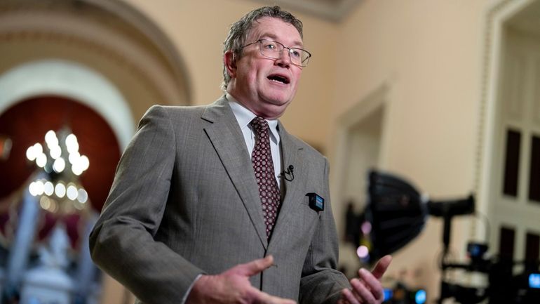 Rep. Thomas Massie, R-Ky., speaks during a TV news interview...