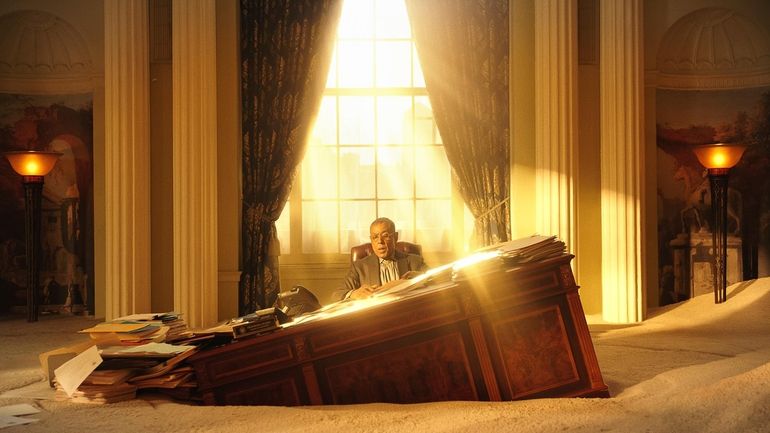 This image released by Lionsgate shows Giancarlo Esposito as Mayor...