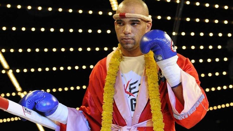 Nick Vaughan enters the ring to fight Birian Hutchings in...