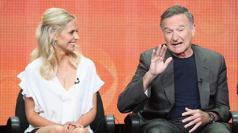 Actors Sarah Michelle Gellar and Robin Williams at a panel...