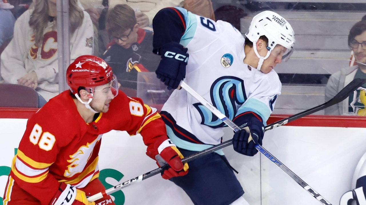 Chris Driedger makes 37 saves in NHL return as Kraken hold off Flames 2 ...
