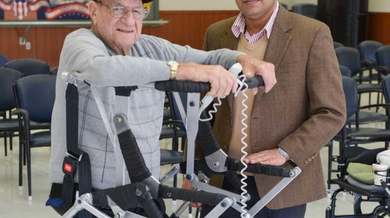 Stony Brook University professor Anurag Purwar with his Mobility Assistant...