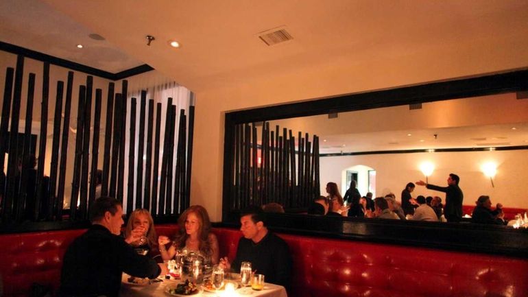 Patrons dine at Philippe, an upscale Chinese restaurant in Jericho....