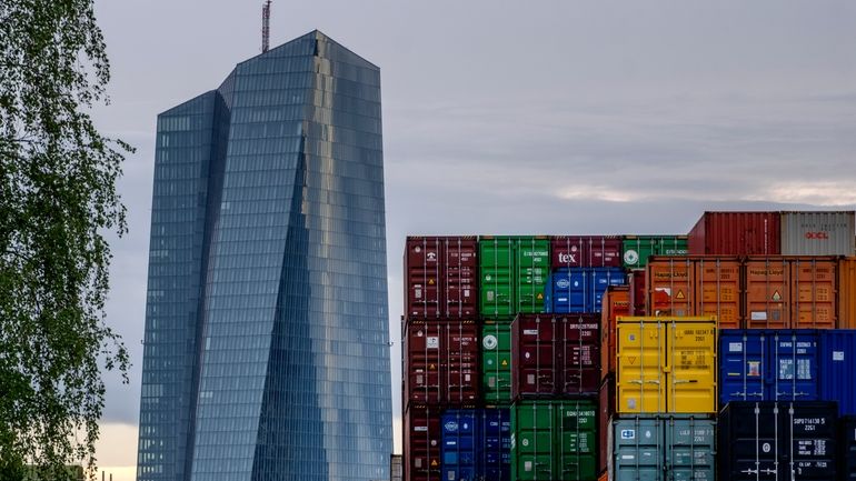 The European Central Bank is pictured next to containers in...