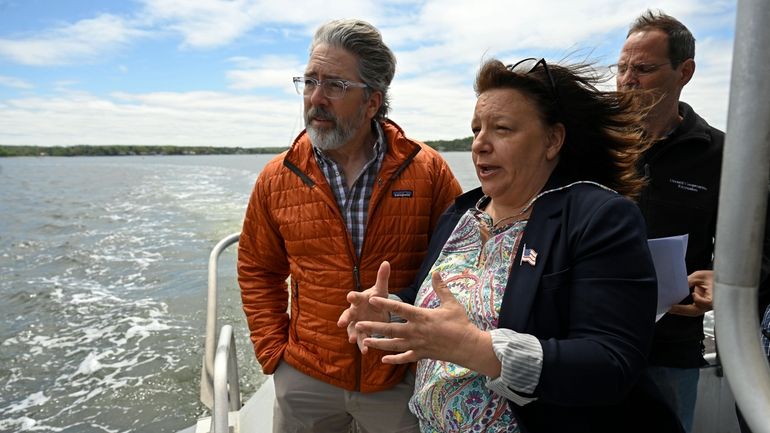 From left, Chris Pickerell, marine program director at Cornell Cooperative...