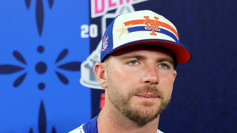 Pete Alonso of the New York Mets speaks to the...