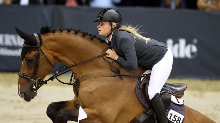 Kristen Vanderveen rides at the 2018 Longines Masters Series at Nassau...