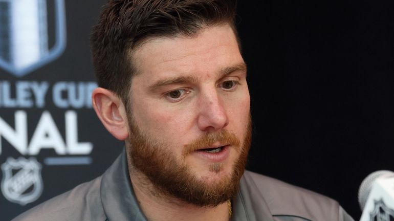 Jonathan Quick speaks with the media during Media Day for...