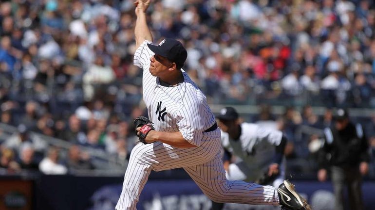 Bartolo Colon pitches against the Detroit Tigers at Yankee Stadium....