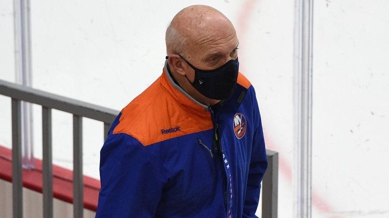 Islanders general manager Lou Lamoriello enters the arena before a...