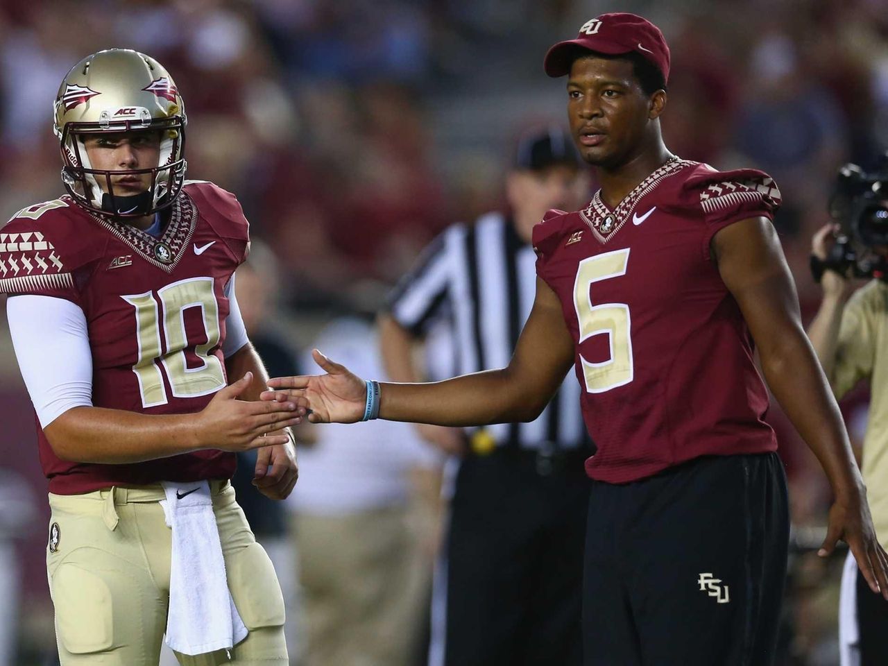 Jameis Winston, suspended Florida State QB, comes out in full pads