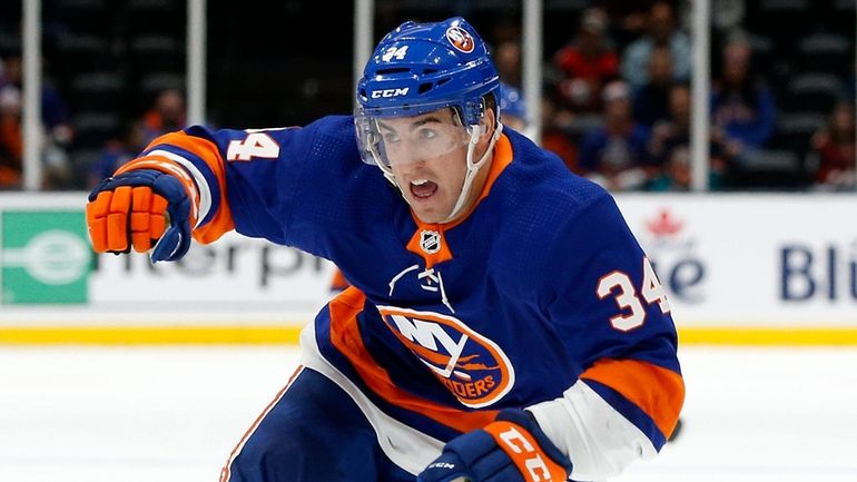 Cole Bardreau #34 of the Islanders skates in the first period...