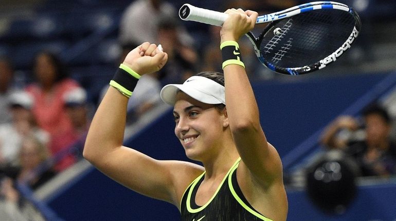 Ana Konjuh of Croatia reacts after she wins her match...