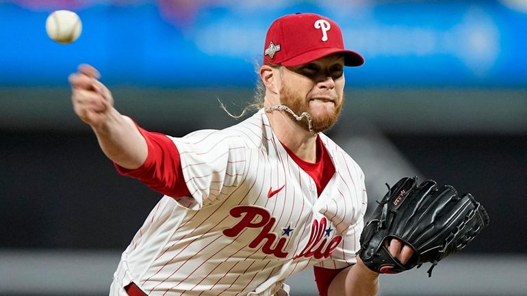 FILE -Philadelphia Phillies relief pitcher Craig Kimbrel throws against the...