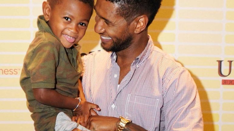 Usher and his son,Usher Raymond V attend Usher's New Look...