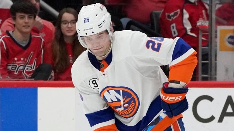 Islanders right wing Oliver Wahlstrom skates with the puck against Capitals...