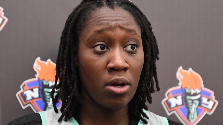 Liberty center Tina Charles speaks to the press during the...
