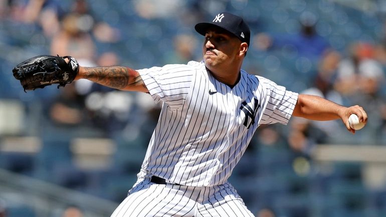 Nestor Cortes #65 of the New York Yankees pitches during...